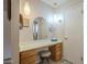 Bathroom vanity with drawers and large mirror at 10027 W Concord Ave, Sun City, AZ 85351