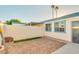 Brick paved patio area with grassy lawn and partial privacy wall at 10030 W Royal Oak Rd # C, Sun City, AZ 85351