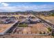 Aerial view of a house with a large lot, RV parking, and a horse corral at 10447 W Appaloosa Trl, Casa Grande, AZ 85194