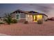 Two-story house with a large garage and landscaped yard at 10447 W Appaloosa Trl, Casa Grande, AZ 85194