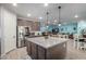 Modern kitchen with granite countertops and stainless steel appliances at 10447 W Appaloosa Trl, Casa Grande, AZ 85194