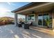 Covered patio with seating area, perfect for outdoor entertaining at 10447 W Appaloosa Trl, Casa Grande, AZ 85194