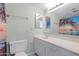 Clean bathroom with double vanity and ocean-themed decor at 10836 N 29Th Ave, Phoenix, AZ 85029