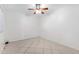 Spacious bedroom with ceiling fan and tile flooring at 10836 N 29Th Ave, Phoenix, AZ 85029