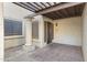 Front entry with a covered patio, column, and tile flooring at 10836 N 29Th Ave, Phoenix, AZ 85029