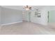 Bright living room with tile floors and open kitchen at 10836 N 29Th Ave, Phoenix, AZ 85029