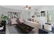 Living room with staged furniture and a view of kitchen at 10836 N 29Th Ave, Phoenix, AZ 85029