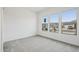 Cozy bedroom with plush carpeting and large windows offering ample natural light at 11441 E Utah Ave, Mesa, AZ 85212