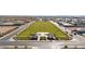 Aerial view of a neighborhood park with ramadas and open green space at 11441 E Utah Ave, Mesa, AZ 85212