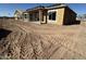 New construction home exterior with desert landscaping at 11441 E Utah Ave, Mesa, AZ 85212