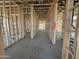 Interior framing of a hallway during the construction phase at 11441 E Utah Ave, Mesa, AZ 85212