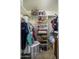 Large walk-in closet with shelving and hanging rods at 11461 E Natal Ave, Mesa, AZ 85209