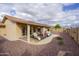 Rear view of house, showing patio and backyard at 11461 E Natal Ave, Mesa, AZ 85209