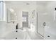 Bright bathroom boasts a soaking tub, double sinks, and glass shower at 11464 E Utah Ave, Mesa, AZ 85212