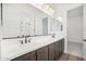 Modern bathroom with double vanity and elegant fixtures at 11464 E Utah Ave, Mesa, AZ 85212