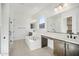 Modern bathroom with double vanity, soaking tub, and walk-in shower at 11464 E Utah Ave, Mesa, AZ 85212