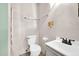 Bathroom with toilet, sink, and shower at 12611 W Gable Hill Dr, Sun City West, AZ 85375