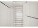 Large closet with shelving and hanging rod at 12611 W Gable Hill Dr, Sun City West, AZ 85375