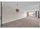 View of a dining room with light walls and a chandelier at 12611 W Gable Hill Dr, Sun City West, AZ 85375