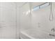 Simple bathroom with shower/tub combo and linen closet at 13407 N Primrose St, El Mirage, AZ 85335