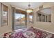 Casual dining area with backyard access and a decorative rug at 14248 W Edgemont Ave, Goodyear, AZ 85395