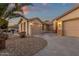 House exterior with driveway and landscaping at 14248 W Edgemont Ave, Goodyear, AZ 85395