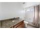 Bathroom with granite countertop vanity and shower/tub combo at 1505 Leisure World --, Mesa, AZ 85206