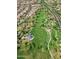 Aerial view of a park featuring a charming gazebo, green lawns, mature trees and walking paths at 15432 W Corrine Dr, Surprise, AZ 85379