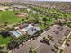 Aerial view of a park with a baseball field, playground, and picnic areas in a residential neighborhood at 15432 W Corrine Dr, Surprise, AZ 85379