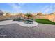 Landscaped backyard oasis with a sparkling pool at 1642 W La Salle St, Phoenix, AZ 85041