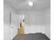 Well-lit bedroom with ceiling fan and carpet flooring at 1642 W La Salle St, Phoenix, AZ 85041