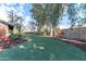 Expansive backyard with lush lawn and mature trees at 17045 N 58Th Way, Scottsdale, AZ 85254