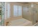 Bathroom with soaking tub, shower, and updated fixtures at 17045 N 58Th Way, Scottsdale, AZ 85254