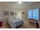 Charming bedroom with wood framed bed, and window shutters at 17045 N 58Th Way, Scottsdale, AZ 85254