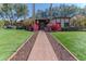 Brick pathway leading to a charming home entrance at 17045 N 58Th Way, Scottsdale, AZ 85254