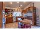 Bright kitchen featuring wood cabinets, butcher block island, and stainless steel appliances at 17045 N 58Th Way, Scottsdale, AZ 85254