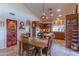 Rustic kitchen with wooden cabinets and island at 17045 N 58Th Way, Scottsdale, AZ 85254