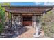 Rustic outdoor workshop with covered patio and antique decor at 17045 N 58Th Way, Scottsdale, AZ 85254