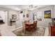 Dining area with a wood table and chairs, near the entryway at 18132 N Villa Bella Dr, Surprise, AZ 85374