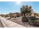 Single story house with landscaped yard and driveway at 18132 N Villa Bella Dr, Surprise, AZ 85374