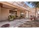 Outdoor living space with covered patio and seating area at 18132 N Villa Bella Dr, Surprise, AZ 85374