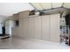 Garage with ample storage and workbench at 18205 N Divet Ln, Surprise, AZ 85374