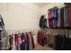 Large walk-in closet with ample hanging and shelf space at 18205 N Divet Ln, Surprise, AZ 85374