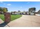 House exterior showcasing a well-maintained lawn and driveway at 1825 W Seldon Way, Phoenix, AZ 85021