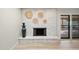 Whitewashed brick fireplace with decorative woven wall hangings at 1825 W Seldon Way, Phoenix, AZ 85021