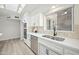 Bright kitchen with white cabinets, quartz countertops, and a double sink at 1825 W Seldon Way, Phoenix, AZ 85021