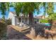 Landscaped backyard with covered patio and pool at 18825 N 34Th St, Phoenix, AZ 85050