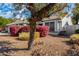 Single-story home with attached garage and red bushes at 18825 N 34Th St, Phoenix, AZ 85050