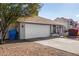 Single-story home with attached garage and desert landscaping at 18825 N 34Th St, Phoenix, AZ 85050