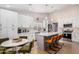 Modern kitchen with white cabinets, marble countertops, and a large island at 18825 N 34Th St, Phoenix, AZ 85050